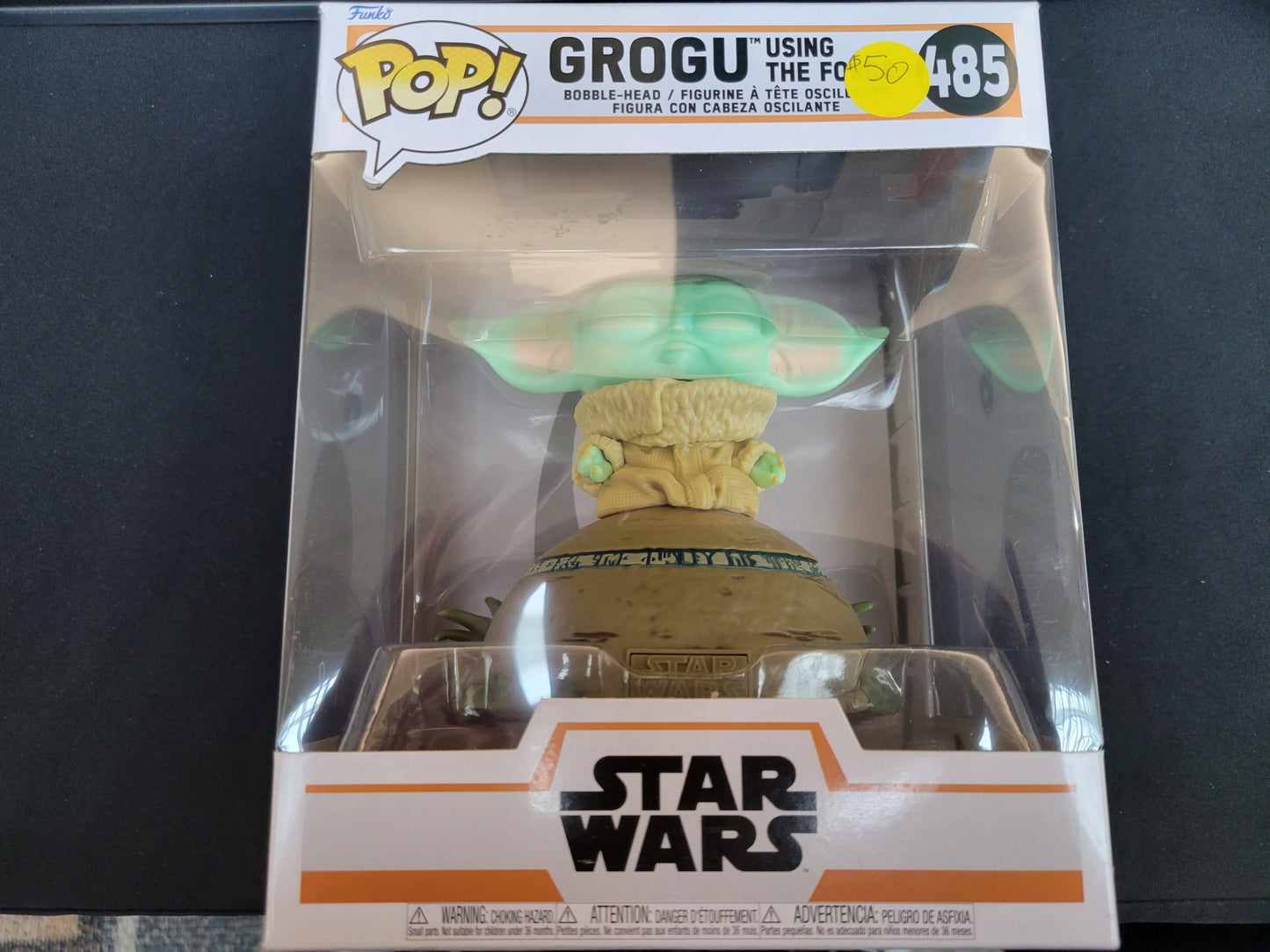 Celebrate the epic saga of the Mandalorian with a POP figure of the child Grogu. These figures come complete with their original box and are in the likeness of your favorite character! Place them in your office, bedroom, or wherever you want to display your allegiance! Vinyl bobblehead is approximately 4.25-inches tall, or 4.15-inches tall.