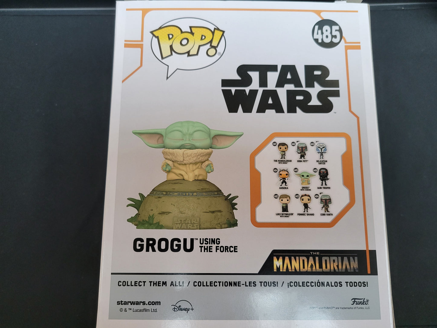 Back of box. Celebrate the epic saga of the Mandalorian with a POP figure of the child Grogu. These figures come complete with their original box and are in the likeness of your favorite character! Place them in your office, bedroom, or wherever you want to display your allegiance! Vinyl bobblehead is approximately 4.25-inches tall, or 4.15-inches tall.