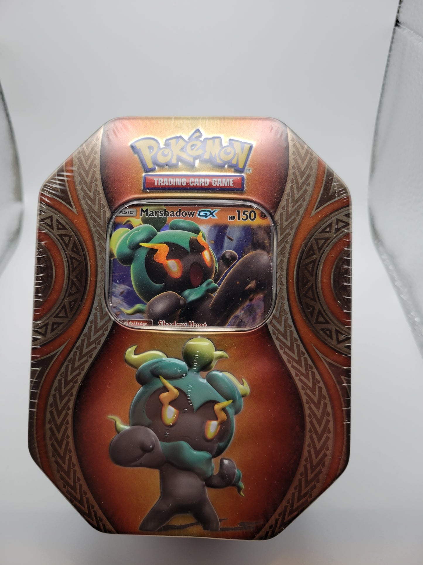 Each Marshadow GX Tin contains one foil promo Marshadow GX card, 4 TCG packs, and one online code cards.
