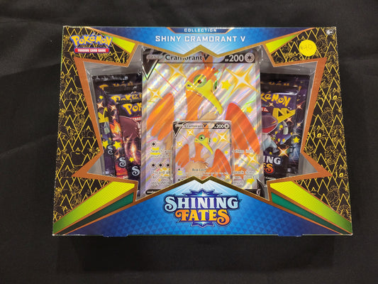 Each Shining Cormorant box comes with one oversized Cormorant card, one holofoil Cormorant card, one online code card and four tcg packs.
