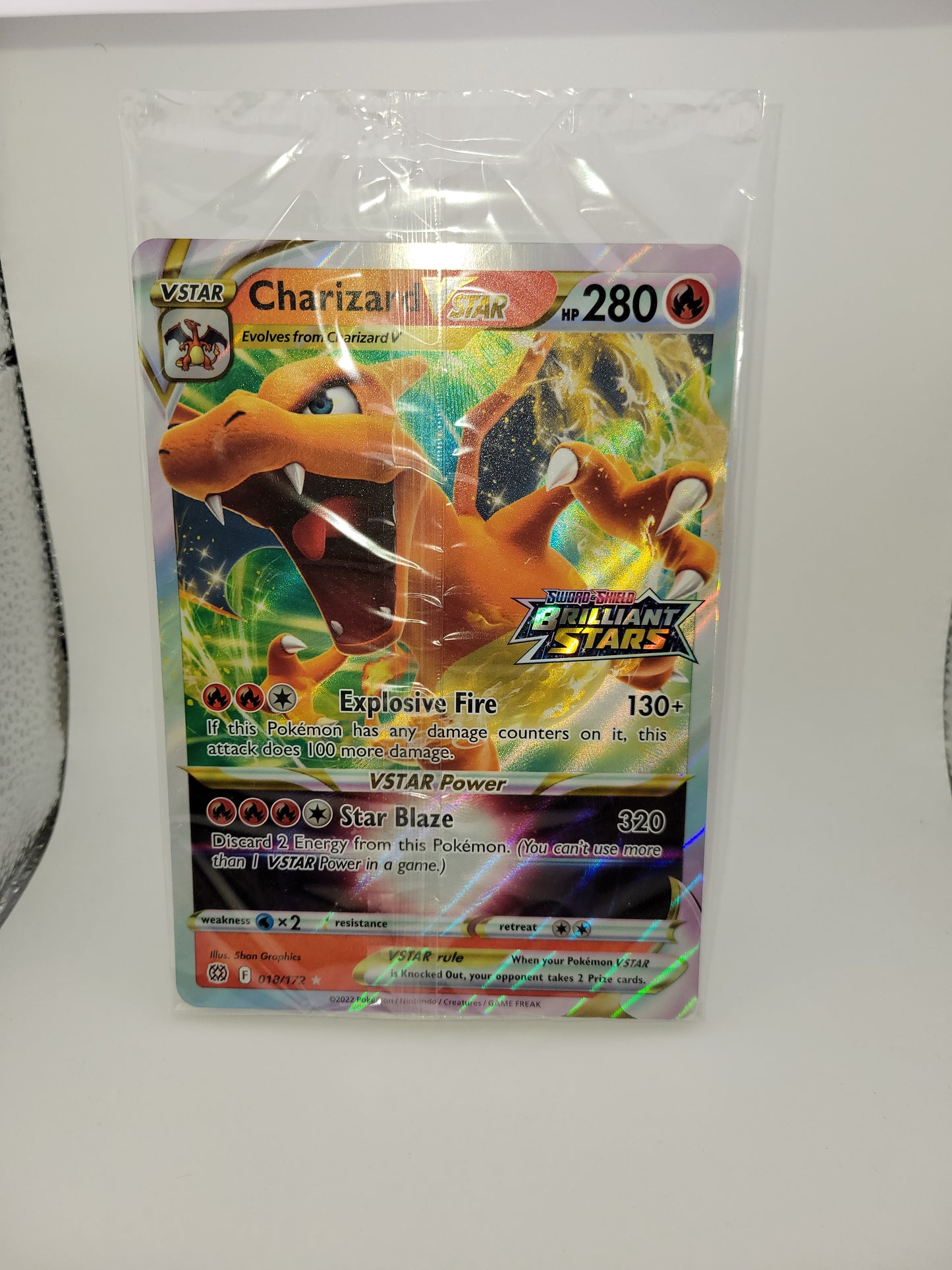 1 Sealed Charizard Oversize Card with UK exclusive Brilliant Stars stamp.